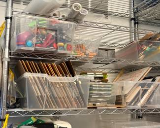 TS018 Chrome wire shelf with officeclassroom supplies boards tape dispensers rubber bands and storage bins