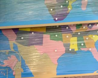 LE009 Detail of stacked wooden geography puzzlemap boards