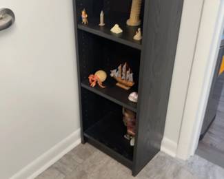 LE062 Narrow black bookcasedisplay shelf with small culturalminiature objects