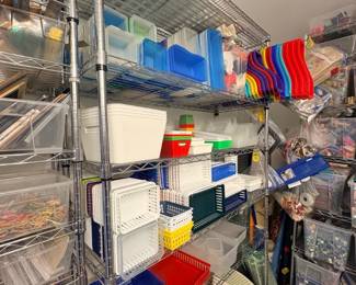 TS017 Chrome wire shelf with assorted plastic trays baskets bins and multiple step stools