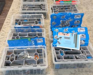 LE061 Large robotics setup multiple VEX IQ kitsparts trays arranged on floor