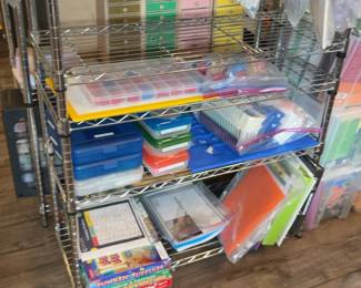 LE021 Wire shelf with bagged lessons plastic cases folders and classroom supplies