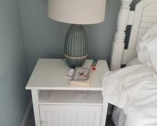 King bedroom suite: nightstand; table lamp