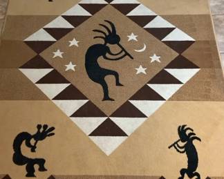 Kokopelli Area Rug
