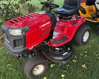 Outside: Troy-bilt riding lawn mower 