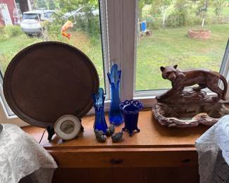 Living Room: cobalt swung vases, Panther tv lamp