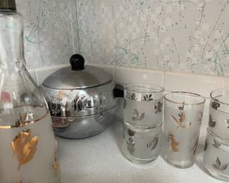 Vintage round, penguin ice bucket, low ball and high ball glasses and decanter