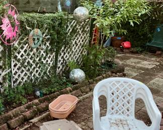 Plastic yard chairs and table