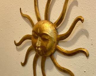 Gold sun figure