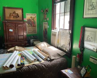Rolled up prints and posters, adjustable bed with remote