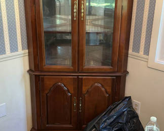 Lot 42: Wooden china cabinet with glass doors