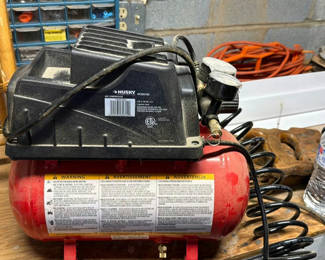 Lot 4: Portable air compressor with hose and workshop tools