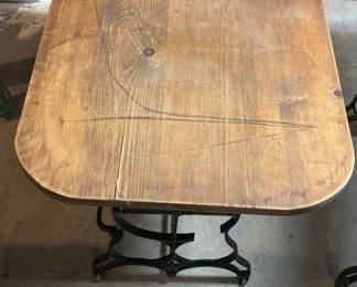 Lot 11: Wooden sewing table with decorative wrought-iron base