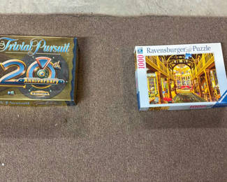 Lot 29: Trivial Pursuit 20th Anniversary Edition and Ravensburger 1000-piece puzzles