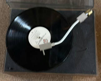 Lot 34: Turntable with vinyl record