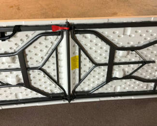 Lot 36: Two-panel folding table with metal frame