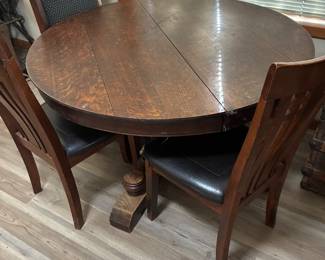 round oak table and 2 chairs