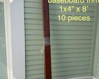 Cherry finished baseboard trim