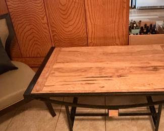 This is an iron and wood coffee table extremely heavy