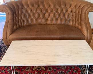 Set of 2 chesterfields and 2 matching heavy marble and iron pencil legs