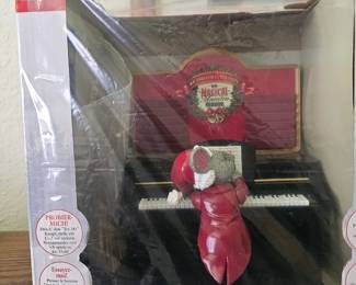 A boxed Magical Maestro Mouse animated musical piano by Mr. Christmas.
