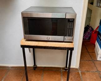 Combination microwave / convection oven with wheeled butcherblock table. This oven is awesome.