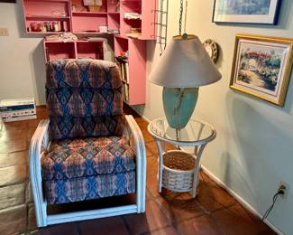 Rattan frame reclining chair with tapestry fabric. Rattan glass top side table. 
