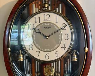 Rhythm Small World Solo Organist Musical Wall Clock