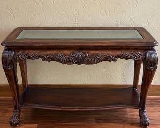 Beautiful Carved Entryway / Console Table – Glass Top   Gorgeous dark wood entryway or console table featuring ornate carved detailing, curved legs, a glass inset top, and a spacious lower shelf.  A beautiful statement piece for an entryway, living room, hallway, or behind a sofa.  Measurements: 53” wide × 18.5” deep × 30” tall  Very nice condition and ready for its new home. Pickup only. 
