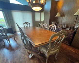Ferguson Copeland Continental Dining Table & 10 Chairs – High-End Designer Set Beautiful Ferguson Copeland Ltd. Continental dining set, featuring an impressive parquet/inlaid wood top, heavily carved base and six matching Continental splat-back chairs. The chairs feature an elegant distressed finish, carved detailing, neutral damask upholstery and nailhead trim. The table has substantial carved legs and beautiful wood grain and veneer work. ✨ Ferguson Copeland Ltd. ✨ Continental Collection ✨ Table + 10 matching chairs ✨ Includes 22” extension leaf ✨ Ornate carved detailing ✨ Beautiful upholstered seating ✨ Quality, substantial construction This is a large statement dining set perfect for a formal dining room or someone looking for traditional European/French-inspired furniture. Measurements: Table: 105” long Leaf: 22” Extended length: approximately 127” Buyer will need appropriate help and transportation. $5,500 contact (208)870-9295 interested buyer