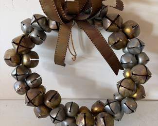 26” metal bell wreath with metal bow $25