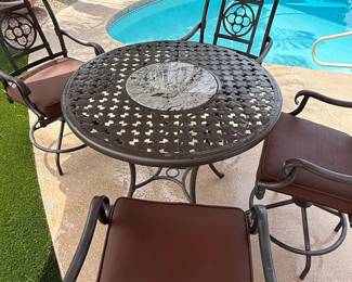 Patio aluminum bar-height table with marble inlay - 4 padded swival bar stools.
