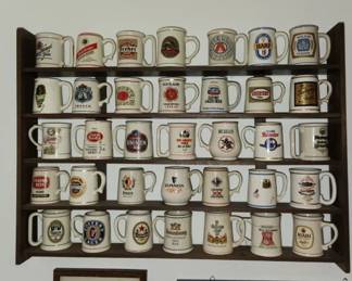 Mini beer mug collection. Sold as a collection, with display shelf