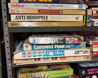 Chutes and Ladders, Careers, Pac-Man Game, Monopoly Chicago Edition, Monopoly, Anti-Monopoly, Clue, Stay Alive, Connect Four, Landslide, Game of Life, Logus Jr., Backgammon, Parcheesi, Othello, Bingo, Giant U.S.A. Map Puzzle, Tic Tac Toe, Bloom
