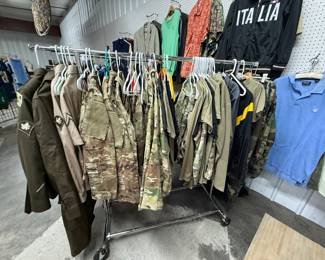 Small Adult Size Military uniform and fatigues. They would fit a small adult or older child.