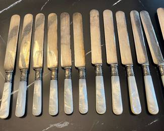 Meriden Cutlery Co. Mother of Pearl, Sterling Silver & Silver Electroplate Blade; 24 pc set of forks & knives