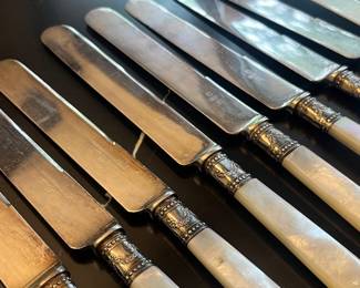 Meriden Cutlery Co. Mother of Pearl, Sterling Silver & Silver Electroplate Blade; 24 pc set of forks & knives