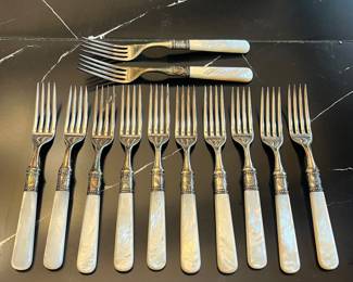 Meriden Cutlery Co. Mother of Pearl, Sterling Silver & Silver Electroplate Blade; 24 pc set of forks & knives