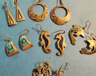 Silver Earrings. Many have Maker's Mark