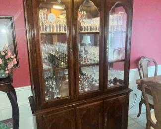 CHINA CABINET FILLED WITH STEMWARE