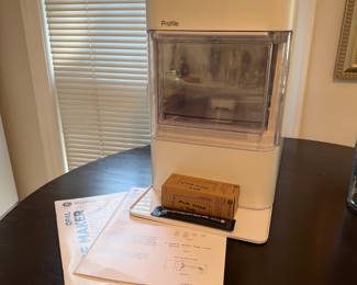 T23 - $200. GE Profile Ice Maker. Model XPIO23SW30W. Looks gently used and in excellent condition.