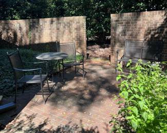 T81 - $275. Cement Top Patio Table with 2 Chairs & Bench. Table measures 27.5" round x 28.5" tall. 2 Arm Chairs are 23" x 22" x 36" tall. Bench is 42.5" x 22" x 36" tall.