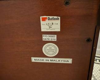 T32 - $175. Mahogany Finish Buffet. Measures 66.5" x 16.5" x 35" tall. Has 4 drawers that all slide easily and 2 glass doors with shelves inside.