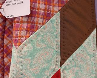 T70 - $150. Multi-Colored Lone Star Quilt. Measures 89" square. Excellent Condition.