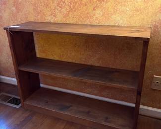 T50 - $65. Wooden Bookcase. Measures 38.5" x 11.25" x 28.25" tall.