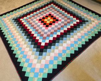 T72 - $150. "Trip Around The World" Style Patchwork Quilt. Measures 83" x 81". Excellent Condition.