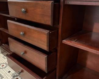 T32 - $175. Mahogany Finish Buffet. Measures 66.5" x 16.5" x 35" tall. Has 4 drawers that all slide easily and 2 glass doors with shelves inside.