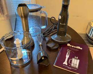 T24 - $60. Breville The Control Grip Immersion Blender Set. One piece has damage at the bottom - see photos.