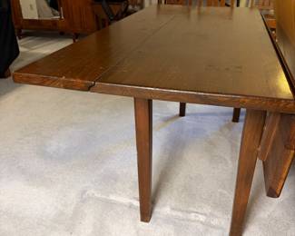 T11 - $250. Pine Harvest Table. As photographed it measures 5' long x 21.5" x 29.5" tall. Each leaf adds 10". Table top alone is 18.5".