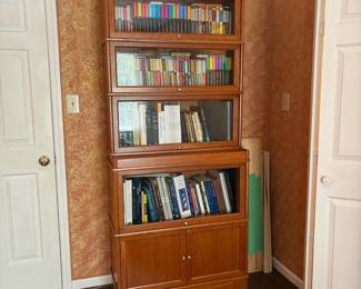 T52 - $450. Barrister Bookcase. All doors open easily. No name found. Excellent Condition. Measures 34.5" x 15.75" x 80.5" tall.